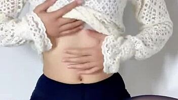 Siganjue tidies up in front of the mirror. She prepares for work carefully.