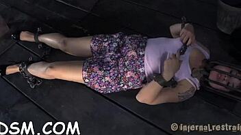 beauty in cage with shaved pussy on display for bdsm