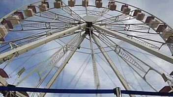 Beautiful latina gives blowjob on outdoor Ferris wheel during casting.