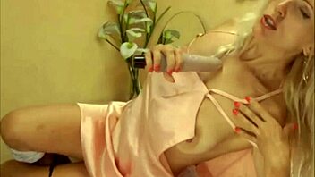Horny blonde plays with her Ohmibod toy on cam