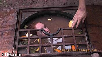 Bound and gagged for punishment in the dark room.