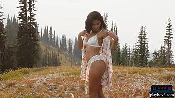 exotic playboy model strips naked on a sunny boat ride