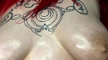 sexy bbw oils up her big natural tits