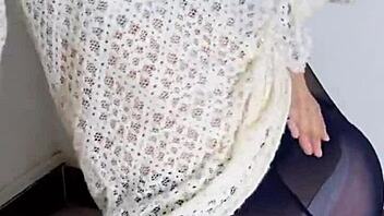 Siganjue tidies up in front of the mirror. She prepares for work carefully.