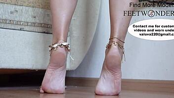 Beautiful feet in toe rings and anklets walk seductively