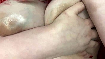 sexy bbw oils up her big natural tits