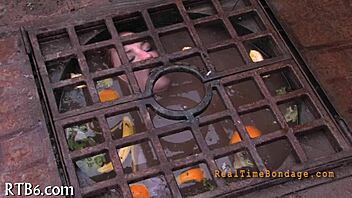 Bound and gagged for punishment in the dark room.