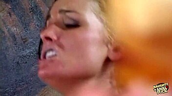 Blonde with belly piercing takes dildo in ass during doggy banging