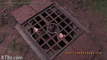 Bound and gagged for punishment in the dark room.