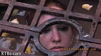 Bound and gagged for punishment in the dark room.