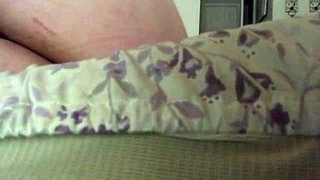 Enjoying some self-pleasure with an anal hook and spanking