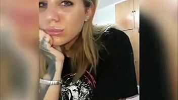 Playing with pierced big boobs on webcam