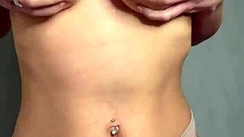 a hot student caresses her big tits in reality