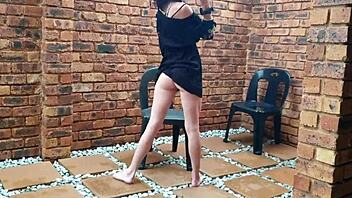 I’m shaking my petite ass while smoking a cigarette and taking a piss