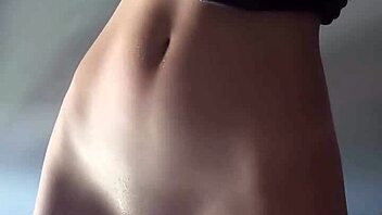 Skinny Maiskii girl pleasures herself with a dildo at home.