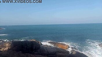 Brazilian fishermen sneak a hard bang on rocky beach