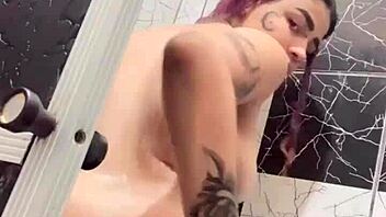 sko ella showing off her tattooed pussy and boobs in the shower