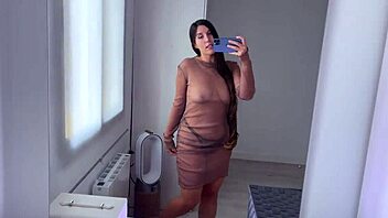 Cute amateur tries on see-through clothes, showing big ass and tits in homemade haul.