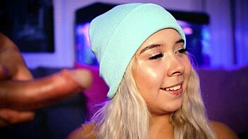 blonde babe giving footjob to boyfriend