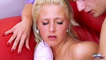 Blonde Nathaly Cherie fucks young dude on the sofa