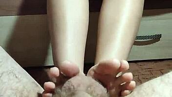 Asian Girl Satisfies Monster Cock With Legs And Hands!