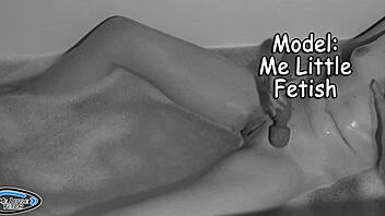 Slender girl enjoys evening bath, uses vibrator for relaxation and orgasm