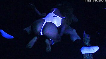 Blacklight BDSM scene with Carrie B and extreme sex acts
