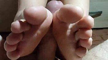 Asian Girl Satisfies Monster Cock With Legs And Hands!