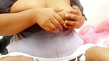 Latina College Girl Studying In Her Dorm Room