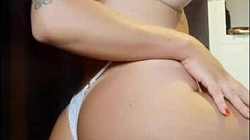 Sultry woman enjoys a sensual video shoot for her friend