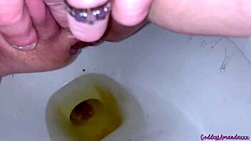 Beautiful brunette gets dirty with toilet water