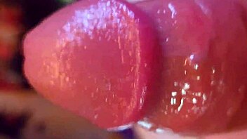 i'm playing with my shaved oiled cock in homemade solo