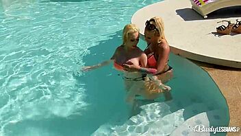 kyra hot and chessie kay finger their pussies by the pool. busty blondes.