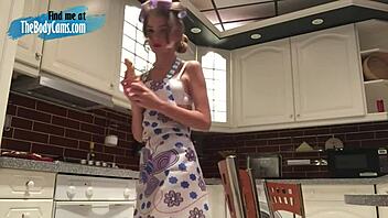 Lovely camgirl masturbates with dildo in kitchen