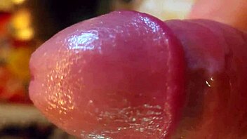 i'm playing with my shaved oiled cock in homemade solo