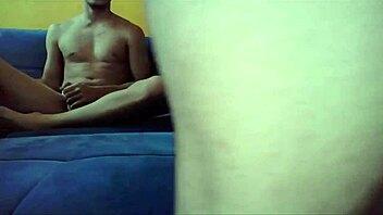 Gay Couple Engages in Intense Bedroom Action