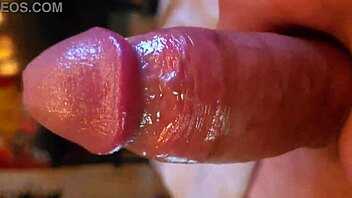 i'm playing with my shaved oiled cock in homemade solo