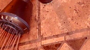 Soapy masseuse strips boldly in the bathroom, ready for action