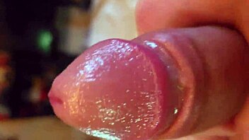 i'm playing with my shaved oiled cock in homemade solo