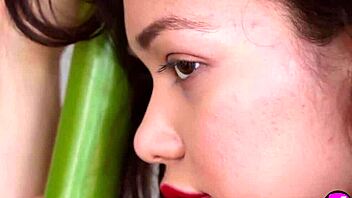 All natural petite Asian teen Kit Rysha undresses, showing her perfect body in softcore.