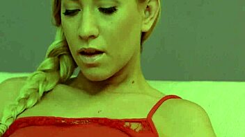 A naked teen masturbates with a sex toy to satisfy her sexual desires