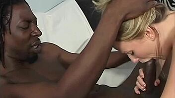 Two girls, one black one white, blow this dick