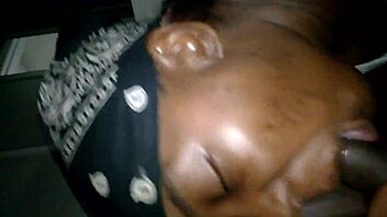 Ebony mom cheats sucking big black cock.