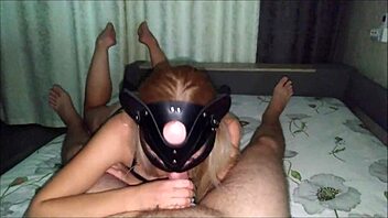 horny blonde in lingerie sucks cock and gets cum in mouth on bare feet