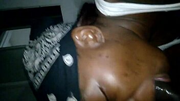 Ebony mom cheats sucking big black cock.