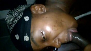 Ebony mom cheats sucking big black cock.