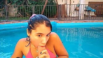 Real life couple enjoys some pool time and gives blow jobs