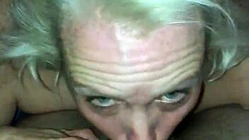 The slutty wife with big tits and ass gives a sexy blowjob to her husband.