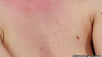 hot beauty gets jizz shot on her face, gulping all the charge in extreme bukkake.