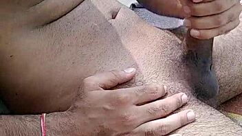 Indian desi gay teases with big cock in public spot